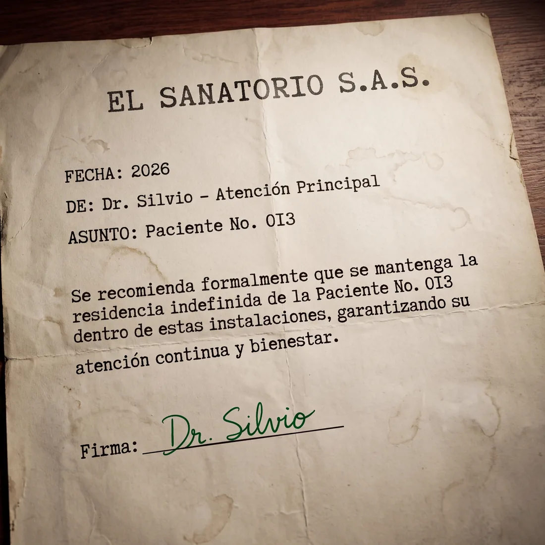 Modern clinical memo on El Sanatorio S.A.S. letterhead, signed by Dr. Silvio in 2026, recommending that Patient 013&rsquo;s indefinite residence be maintained at these facilities.